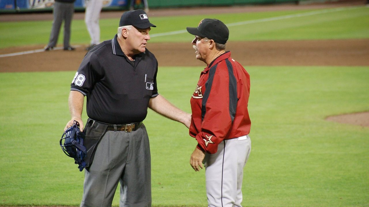 Astros manager Phil Garner arguing with umpires after a balk was called on Roy Oswalt in 2006