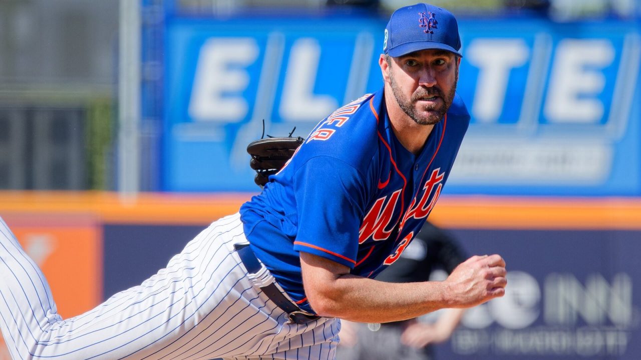 Justin Verlander throwing a pitch from the mound in March 2023
