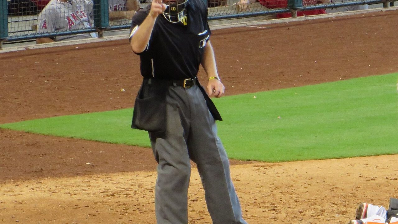 Home plate umpire Lance Barksdale signaling a called strike during a 2013 Astros vs. Angels game